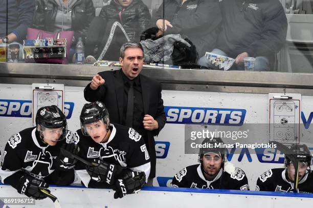 Head coach of the Blainville-Boisbriand Armada Joel Bouchard calls out instructions to his team against the Drummondville Voltigeurs during the QMJHL...