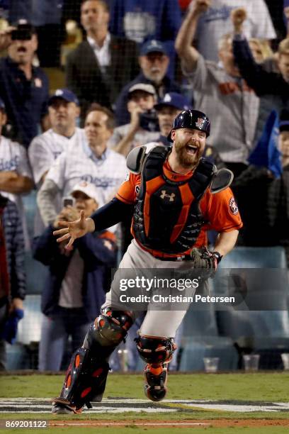 Brian McCann of the Houston Astros celebrates after defeating the Los Angeles Dodgers in game seven with a score of 5 to 1 to win the 2017 World...