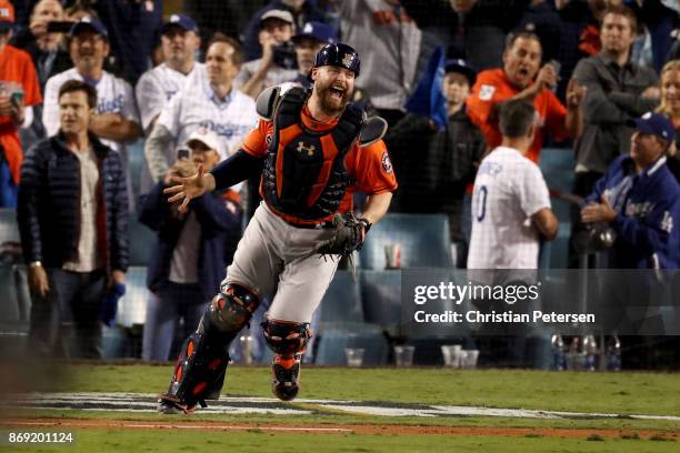 Brian McCann of the Houston Astros celebrates after defeating the Los Angeles Dodgers in game seven with a score of 5 to 1 to win the 2017 World...