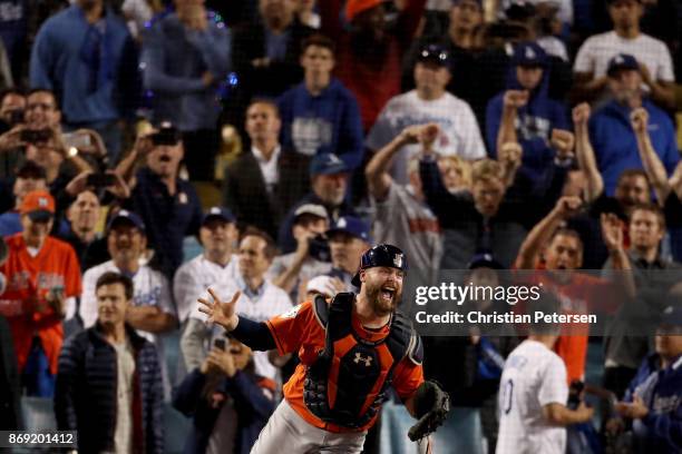 Brian McCann of the Houston Astros celebrates after defeating the Los Angeles Dodgers in game seven with a score of 5 to 1 to win the 2017 World...