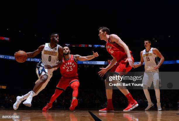 Emmanuel Mudiay of the Denver Nuggets handles the ball against the Toronto Raptors on November 1, 2017 at the Pepsi Center in Denver, Colorado. NOTE...