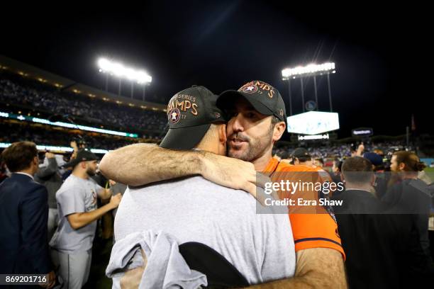 Justin Verlander of the Houston Astros celebrates after defeating the Los Angeles Dodgers 5-1 in game seven to win the 2017 World Series at Dodger...