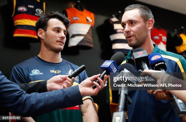 Robbie Tarrant of the Kangaroos and Jack Gunston of the Hawks speak to the media during a Australia International Rules Media Opportunity at AFL...