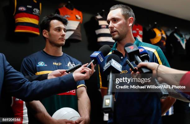 Robbie Tarrant of the Kangaroos and Jack Gunston of the Hawks speak to the media during a Australia International Rules Media Opportunity at AFL...