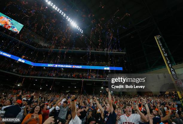 Houston fans celebrate after the Houston Astros defeated the Los Angeles Dodgers in Game 7 of the World Series during a Houston Astros World Series...