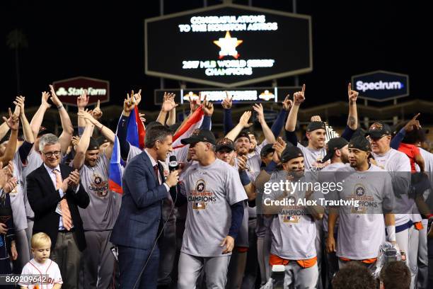 Members of the Houston Astros celebrate after defeating the Los Angeles Dodgers in Game 7 of the 2017 World Series at Dodger Stadium on Wednesday,...