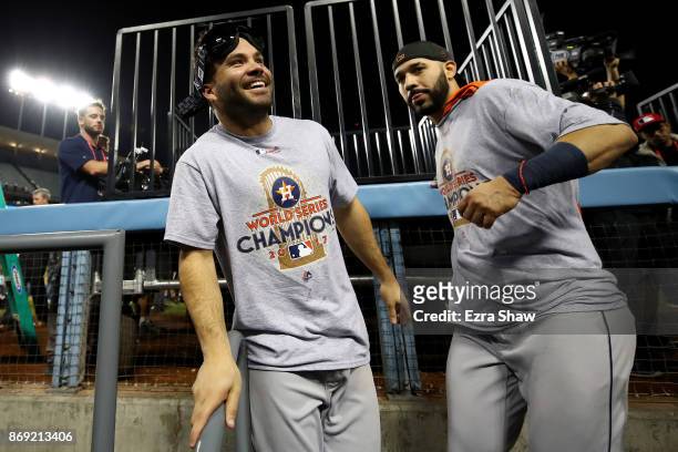 Jose Altuve of the Houston Astros celebrates with Marwin Gonzalez after defeating the Los Angeles Dodgers 5-1 in game seven to win the 2017 World...