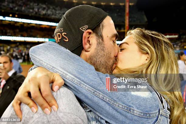 Justin Verlander of the Houston Astros celebrates with fiancee Kate Upton after the Astros defeated the Los Angeles Dodgers 5-1 in game seven to win...