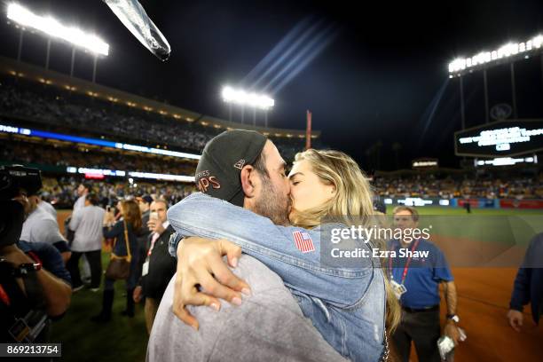 Justin Verlander of the Houston Astros celebrates with fiancee Kate Upton after the Astros defeated the Los Angeles Dodgers 5-1 in game seven to win...