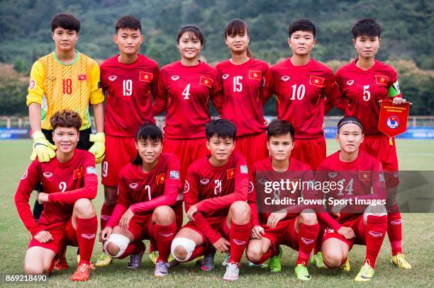 Vietnam squad pose for team photo Doan Thi Ngoc Phuong, #19 Tran Thi Hai Linh, #4 Ngoc Le, #15 Nguyen Thi Hoa, #10 Tuyet Ngan, #5 Nguyen Thi Minh...