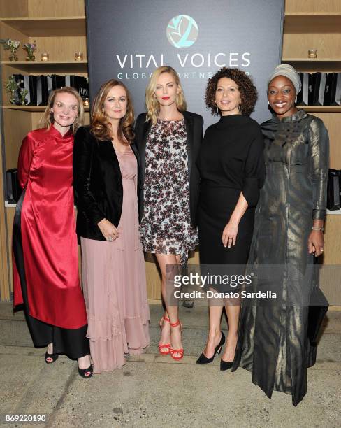 President and CEO, Vital Voices, Alyse Nelson, Editor-in-Chief of PORTER, Lucy Yeomans, Charlize Theron, Chairman of Universal Pictures, Donna...