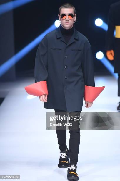 Model showcases designs on the runway at GDU collection by designer Liu Yu during the Mercedes-Benz China Fashion Week Spring/Summer 2018 at 751D...