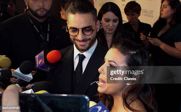 Eva Longoria and Maluma speak to the media during the red carpet of The Global Gift Gala at St Regis Hotel on November 01, 2017 in Mexico City,...