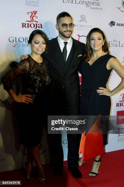 Maluma and Eva Longoria pose during the red carpet of The Global Gift Gala at St Regis Hotel on November 01, 2017 in Mexico City, Mexico.