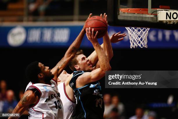 Tom Abercrombie of the Breakers goes up against Ramone Moore of the 36ers during the round five NBL match between the New Zealand Breakers and the...