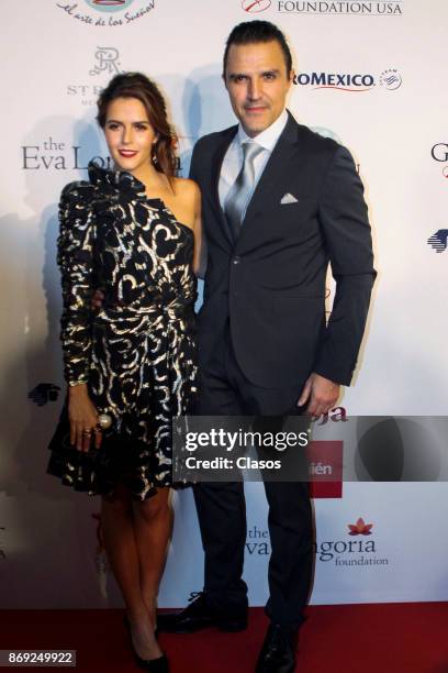 Claudia Alvarez and Billy Rovzar pose during the red carpet of The Global Gift Gala at St Regis Hotel on November 01, 2017 in Mexico City, Mexico.