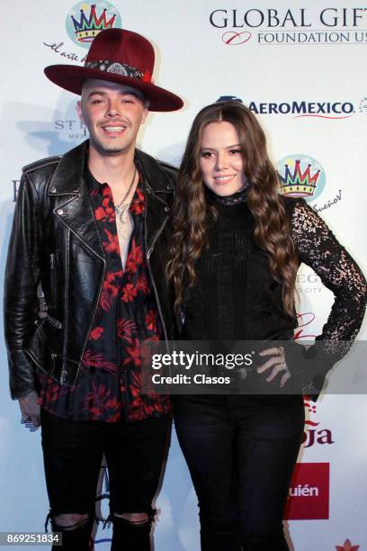 Jesse and Joy pose during the red carpet of The Global Gift Gala at St Regis Hotel on November 01, 2017 in Mexico City, Mexico.
