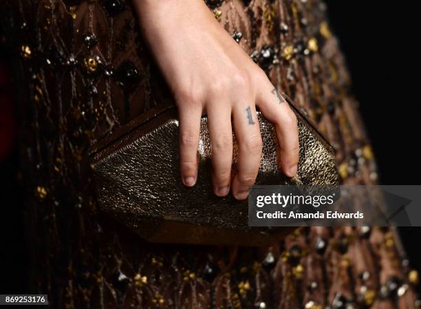 Singer Halsey, clutch detail, arrives at Spotify's Inaugural Secret Genius Awards on November 1, 2017 in Los Angeles, California.