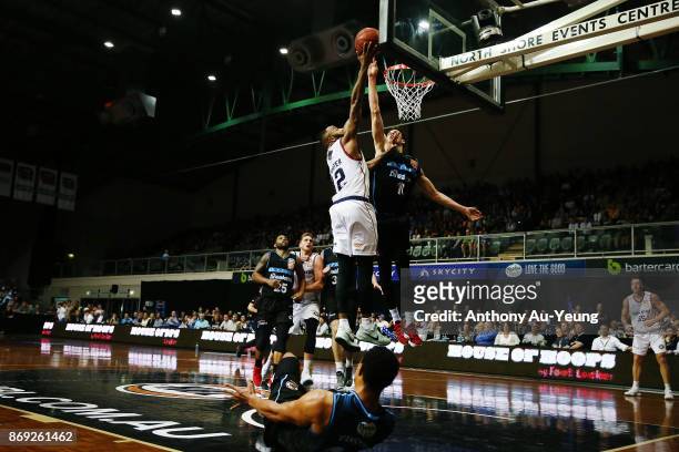 Tom Abercrombie of the Breakers blocks the shot from Shannon Shorter of the 36ers during the round five NBL match between the New Zealand Breakers...
