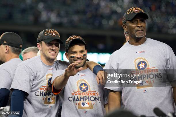 Jose Altuve and Alex Bregman of the Houston Astros celebrate on the field after the Astros defeated the Los Angeles Dodgers in Game 7 of the 2017...