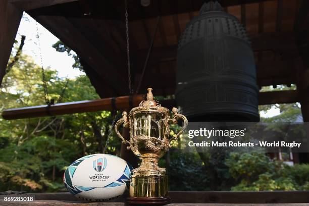 Webb Ellis Cup is seen with the official match ball during the Rugby World Cup 2019 match schedule announcement at Grand Prince Hotel Shin Takanawa...