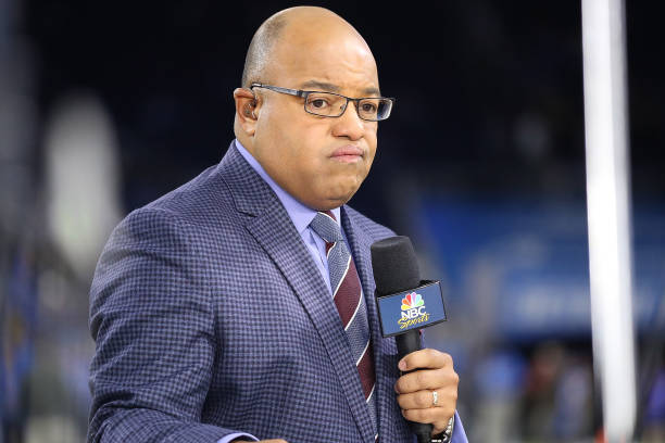 S announcer Mike Tirico gets ready for the Sunday night NFL game between the Pittsburgh Steelers and the Detroit Lions at Ford Field on October 29,...