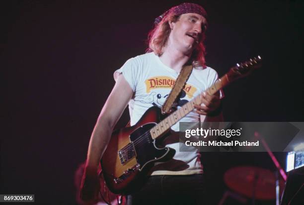 'Hotel California Tour': American singer-songwriter and guitarist Joe Walsh of rock group Eagles performs at Wembley Arena, 27th April 1977.