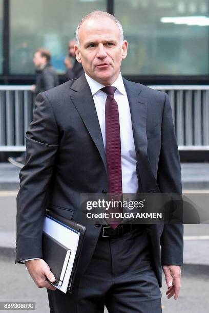 Tesco CEO Dave Lewis arrives at Southwark Crown Court in London on November 2, 2017 to give evidence at the trial of Tesco employees charged with...