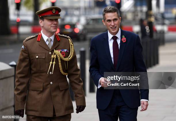 Gavin Williamson arrives with Colonel John Clark, Military Advisor to the Prime Minister, at the Ministry of Defence after he was announced as the...