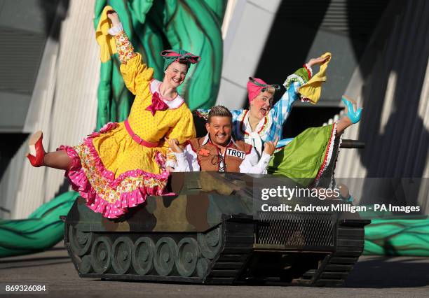 Tank Commander in his tank with other cast members at the press launch for this years pantomime Jack and the Beanstalk, at the SEC Armadillo in...