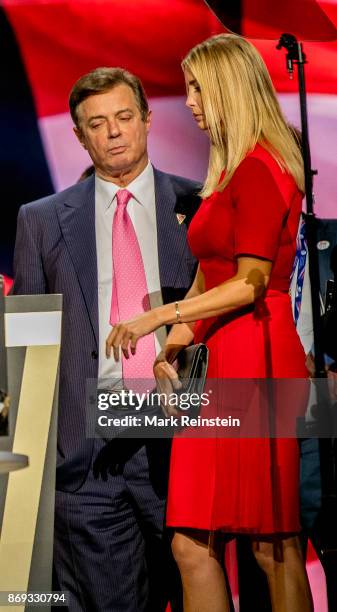 Trump campaign manager Paul Manafort talks with Ivanka Trump during the sound check on the final day of the Republican National Convention at Quicken...