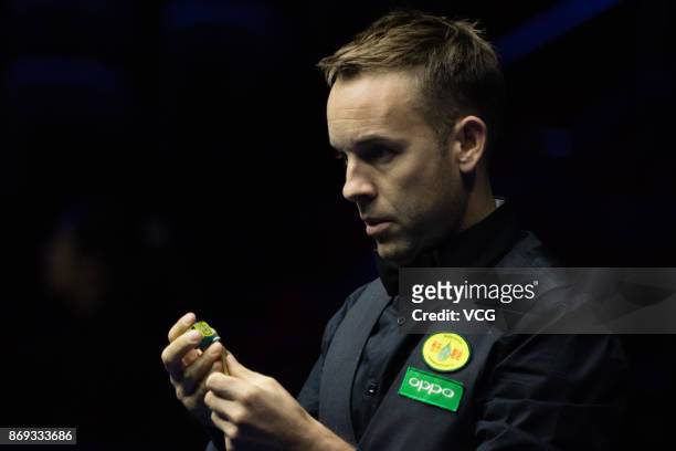 Ali Carter of England reacts during the quarter-final match against Martin Gould of England on Day five of the 2017 Snooker International...
