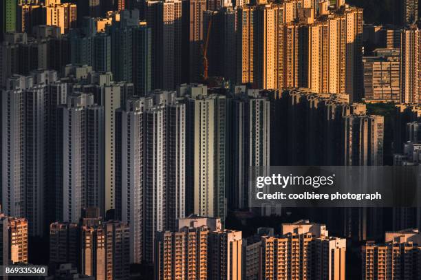 high density of residential blocks in hong kong - isla de hong kong fotografías e imágenes de stock