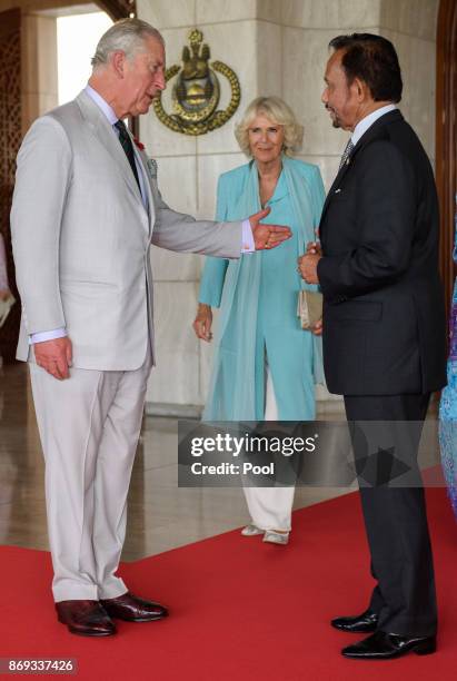 Prince Charles, Prince of Wales, Camilla, Duchess of Cornwall greet his Majesty Hassanal Bolkiah, The Sultan of Brunei at the Istana Nurul Iman on...