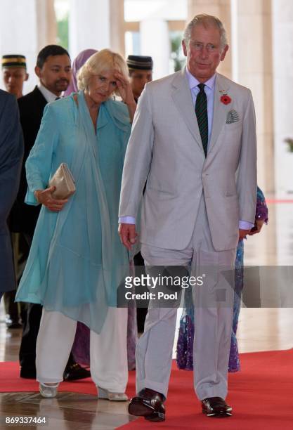 Prince Charles, Prince of Wales, Camilla, Duchess of Cornwall prepare to greet his Majesty Hassanal Bolkiah, The Sultan of Brunei at the Istana Nurul...