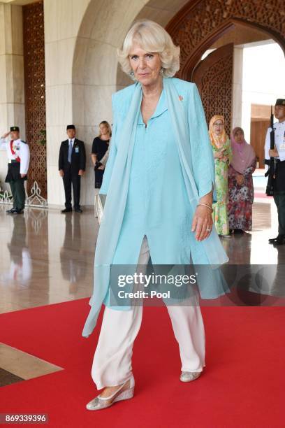 Camilla, Duchess of Cornwall arrives to be escorted to the Green Room for tea at the Istana Nurul Iman on November 2, 2017 in , Bandar Seri Begawan,...