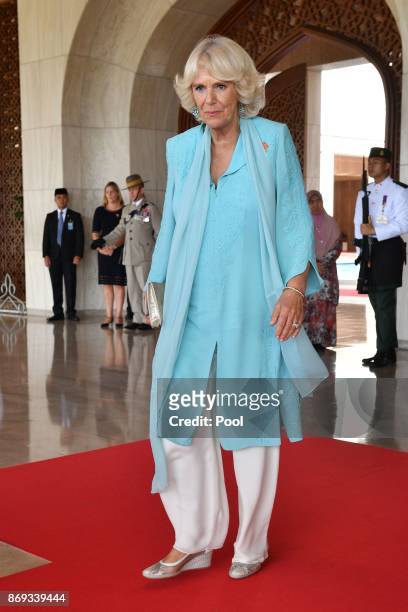 Camilla, Duchess of Cornwall arrives to be escorted to the Green Room for tea at the Istana Nurul Iman on November 2, 2017 in , Bandar Seri Begawan,...