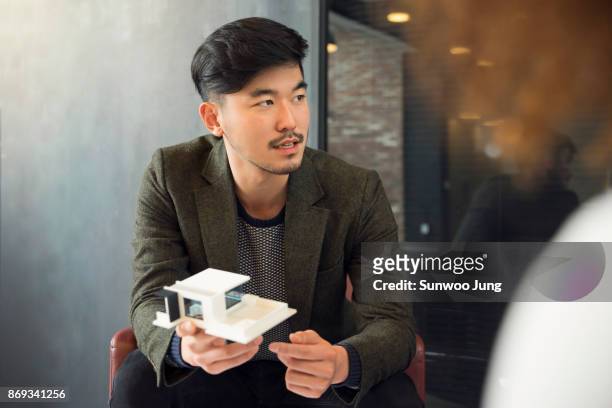 portrait of creative professional with model - asian males stock pictures, royalty-free photos & images