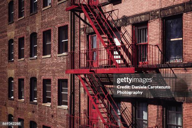 fire escape - bronx stock-fotos und bilder