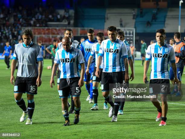Egidio Arevalo Rios,Enrique Triverio and Pablo Cuadra of Racing Club leave the field after being disqulified in a second leg match between Racing...