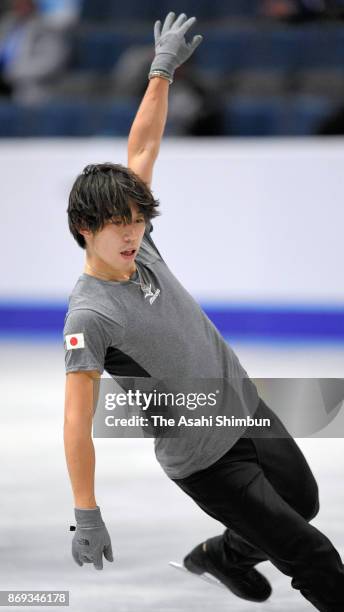 Takahito Mura of Japan in action during a practice session prior to the Men's Singles Short Program during day one of the ISU Grand Prix of Figure...