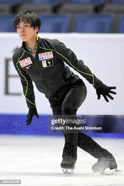 Shoma Uno of Japan in action during a practice session prior to the Men's Singles Short Program during day one of the ISU Grand Prix of Figure...