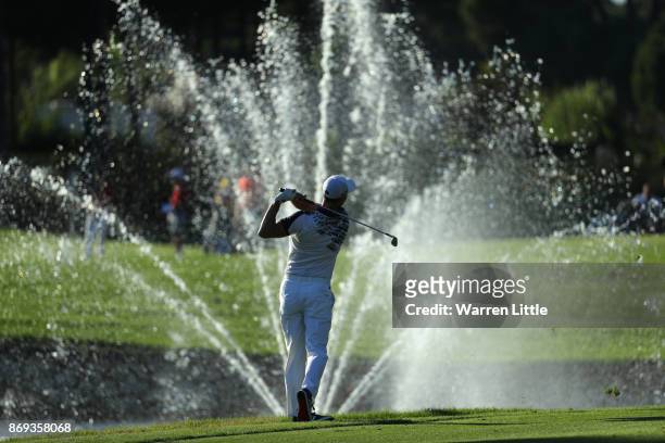 Martin Kaymer of Germany hits his second shot on the 18th hole during the first round of the Turkish Airlines Open at the Regnum Carya Golf & Spa...