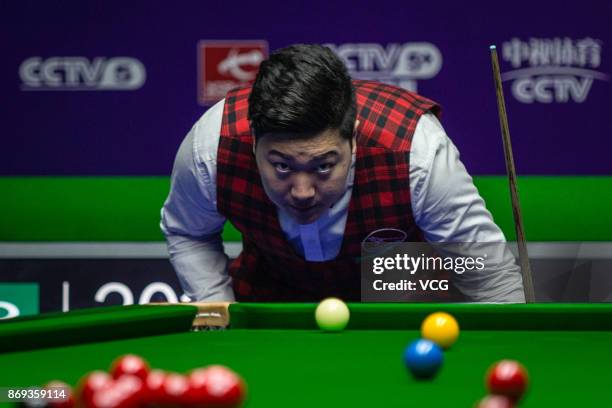 Yan Bingtao of China reacts during the quarter-final match against John Higgins of Scotland on Day five of the 2017 Snooker International...