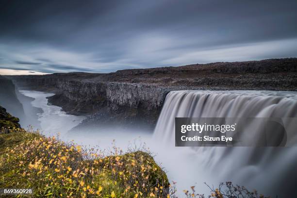 spectacular dettifoss waterfall with a jökulsárgljúfur canyon in northern iceland. - dettifoss falls stock pictures, royalty-free photos & images