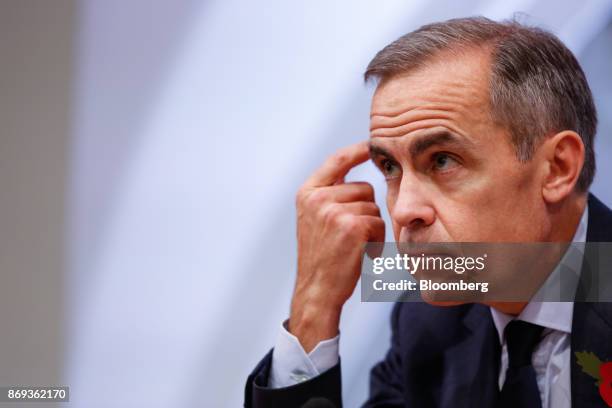 Mark Carney, governor of the Bank of England , pauses during the bank's quarterly inflation report news conference in the City of London, U.K., on...