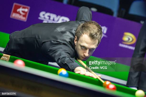 Judd Trump of England plays a shot during the quarter-final match against Mark Allen of Northern Ireland on Day five of the 2017 Snooker...