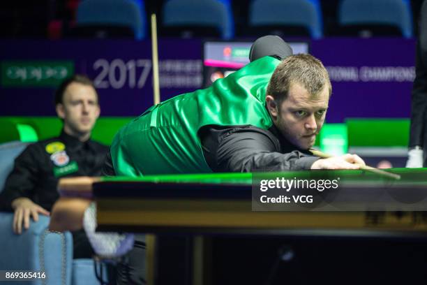 Mark Allen of Northern Ireland reacts during the quarter-final match against Judd Trump of England on Day five of the 2017 Snooker International...