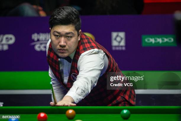 Yan Bingtao of China reacts during the quarter-final match against John Higgins of Scotland on Day five of the 2017 Snooker International...
