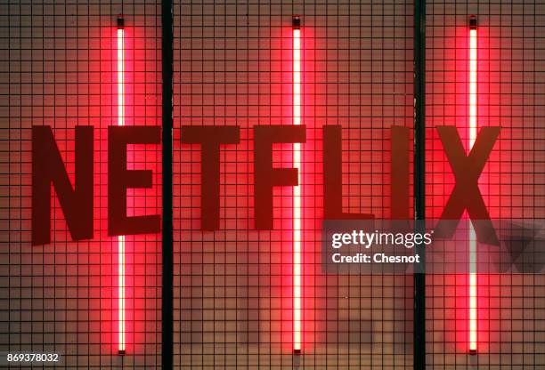 Netflix logo is displayed during the 'Paris Games Week' on November 02, 2017 in Paris, France. Netflix is an American company offering streaming...